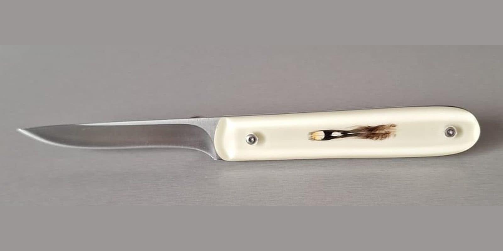 Petit couteau à filets, Insertion de véritable plume, « Jungle Coq »